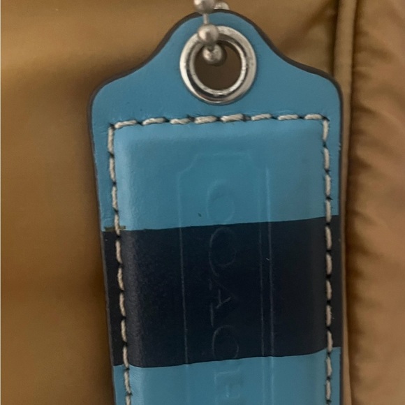 COACH 
•Sateen Leather 
•Gold outside 
•Blue interior 
•Satchel Handbag
•F11992 - Picture 3 of 6